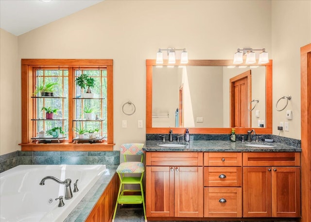 44 Watawga Way W, Gouldsboro, PA 18424 - bathroom featuring vaulted ceiling, double vanity, and a whirlpool tub