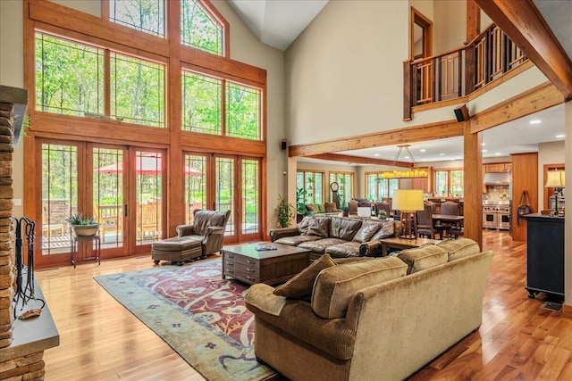 44 Watawga Way W, Gouldsboro, PA 18424 - living area featuring high vaulted ceiling, light wood-style flooring, and french doors