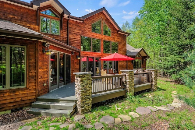 44 Watawga Way W, Gouldsboro, PA 18424 - rear view of house with a wooden deck