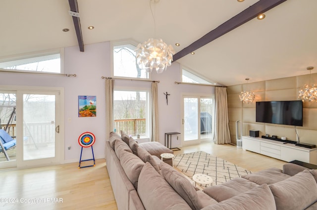 living room featuring high vaulted ceiling, a notable chandelier, light wood finished floors, and beamed ceiling