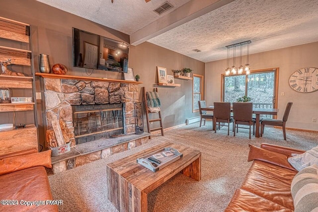 carpeted living area featuring baseboards, visible vents, beam ceiling, a stone fireplace, and a textured ceiling