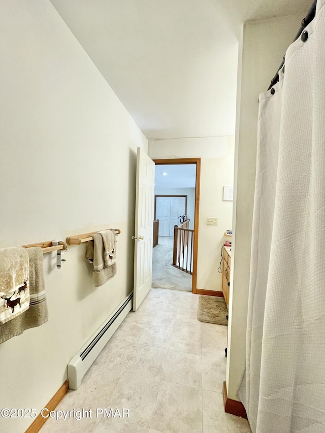 bathroom with baseboard heating