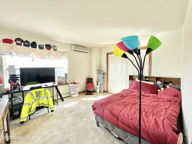 bedroom with a wall unit AC, baseboard heating, and carpet