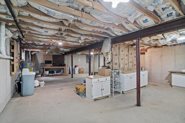 2615 Vista Dr, Blakeslee, PA 18610 - unfinished below grade area featuring electric water heater and a water softener system