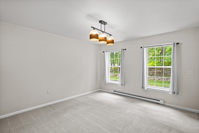 2615 Vista Dr, Blakeslee, PA 18610 - carpeted spare room featuring a baseboard heating unit and baseboards