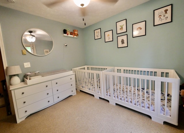 426 Indian Way E, Stroudsburg, PA 18302 - carpeted bedroom featuring a crib and ceiling fan