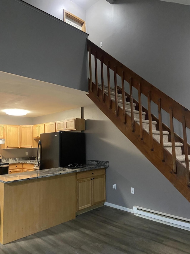 328 Crewe Ct, Bushkill, PA 18324 - staircase featuring a baseboard radiator, wood finished floors, and baseboards