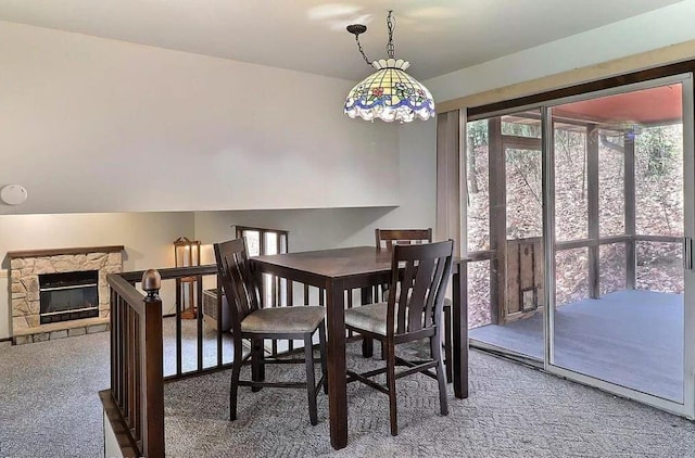 1019 Jackson View Rd, Stroudsburg, PA 18360 - dining room with carpet and a stone fireplace