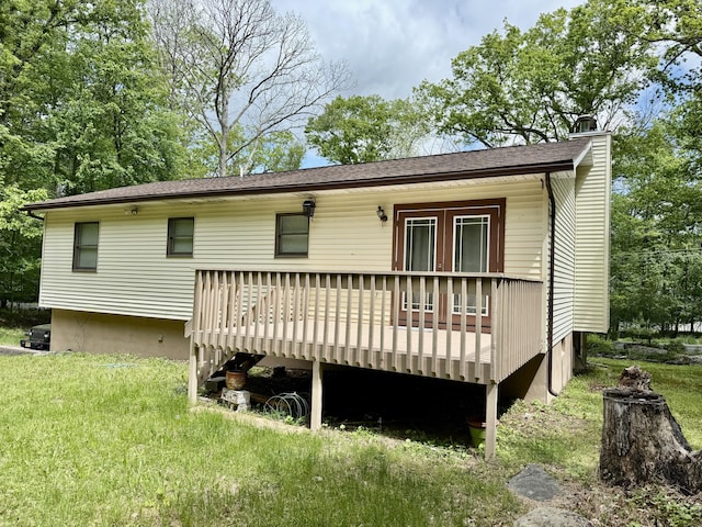 1223 Coolbaugh Rd, East Stroudsburg, PA 18302 - rear view of property featuring a wooden deck and a chimney