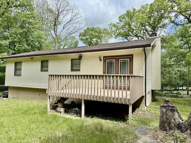 1223 Coolbaugh Rd, East Stroudsburg, PA 18302 - back of house featuring a deck and a chimney
