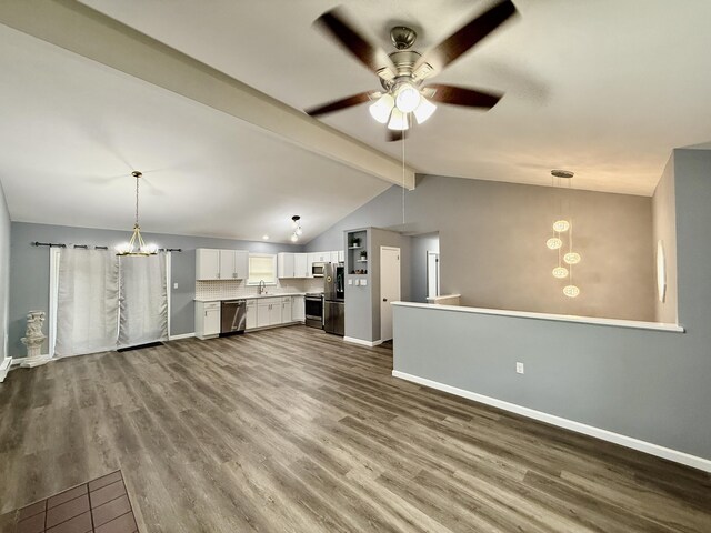 1223 Coolbaugh Rd, East Stroudsburg, PA 18302 - unfurnished living room with dark wood finished floors, ceiling fan, a chandelier, and baseboards