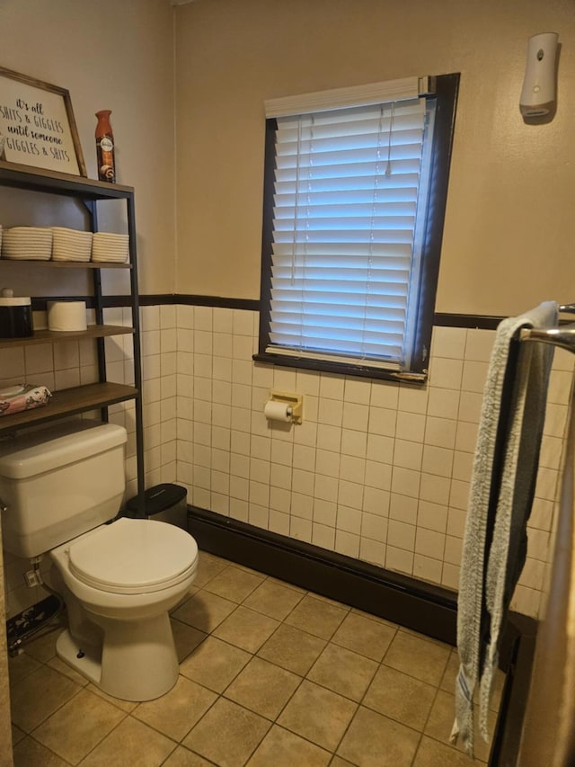 159 Summit Ave, Pocono Summit, PA 18346 - bathroom with tile walls, a wainscoted wall, and tile patterned flooring