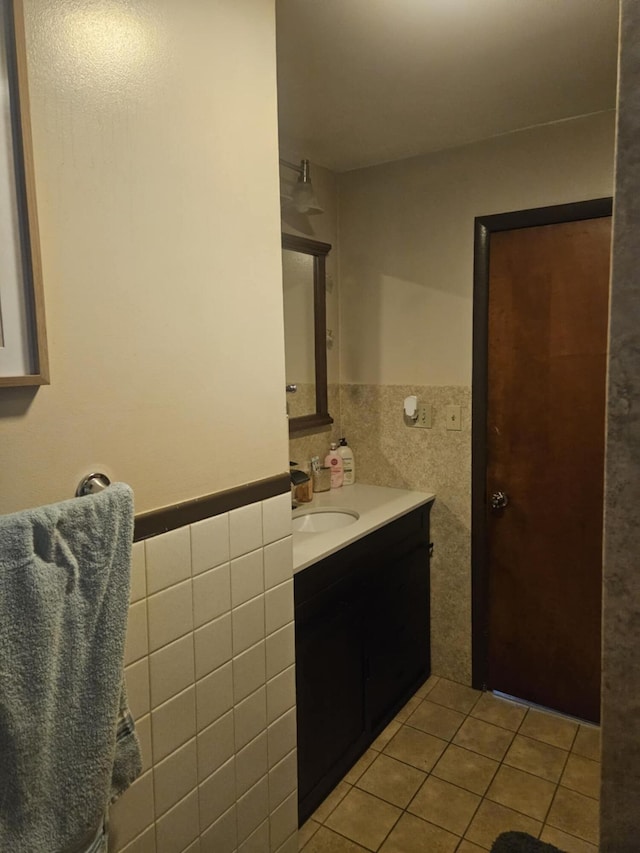 159 Summit Ave, Pocono Summit, PA 18346 - bathroom with tile walls, vanity, tile patterned flooring, and wainscoting