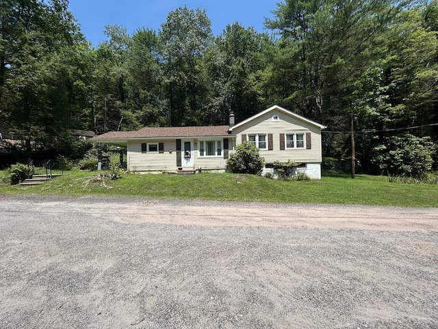 70 Indian Run Rd, Weatherly, PA 18255 - single story home featuring a front lawn and a chimney