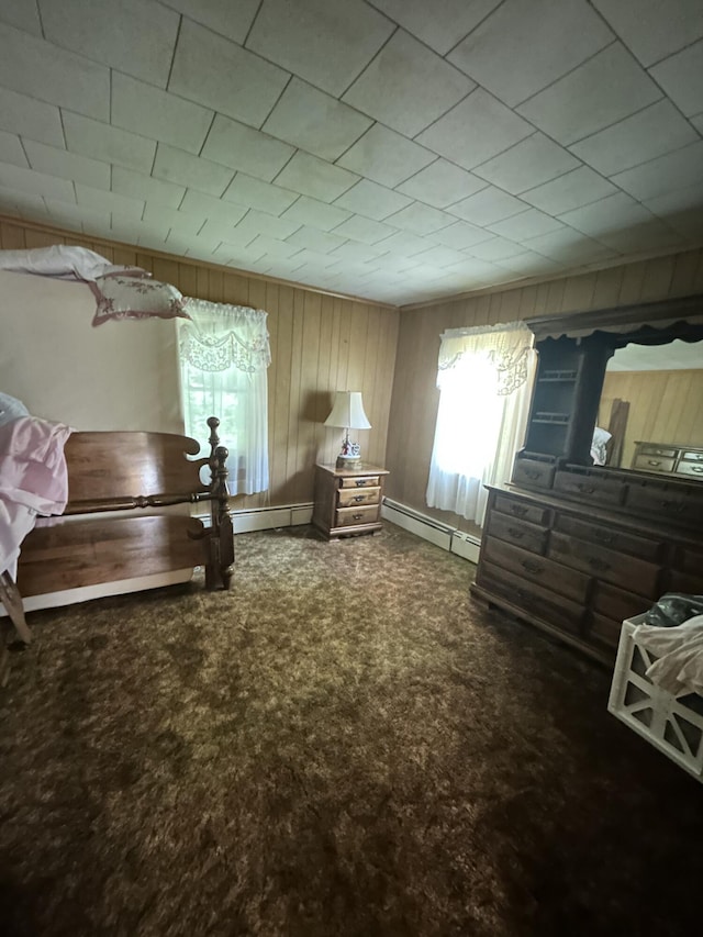70 Indian Run Rd, Weatherly, PA 18255 - carpeted bedroom featuring a baseboard heating unit and wood walls