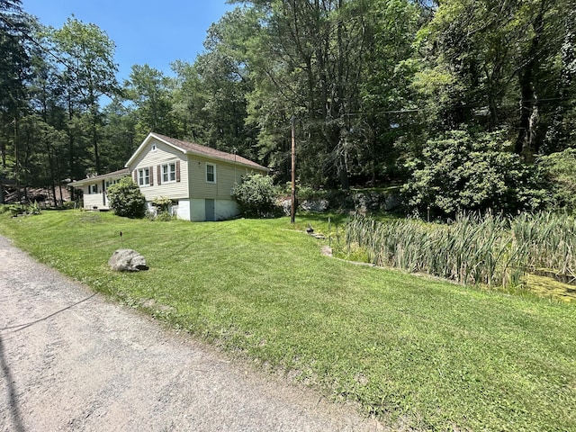 70 Indian Run Rd, Weatherly, PA 18255 - view of property exterior with a lawn and a forest view