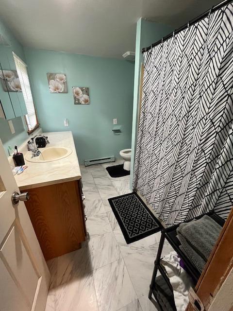 501 Lake Spangenberg Rd, Jefferson Township, PA 18436 - bathroom with baseboard heating, vanity, and a shower with curtain