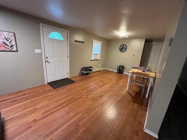 501 Lake Spangenberg Rd, Jefferson Township, PA 18436 - foyer entrance with wood finished floors, a baseboard radiator, and cooling unit