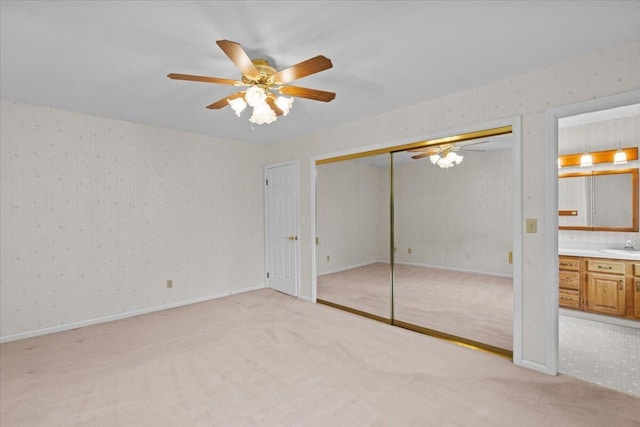 127 Ladderback Ln, Cresco, PA 18326 - unfurnished bedroom with light carpet, a closet, a ceiling fan, and a sink