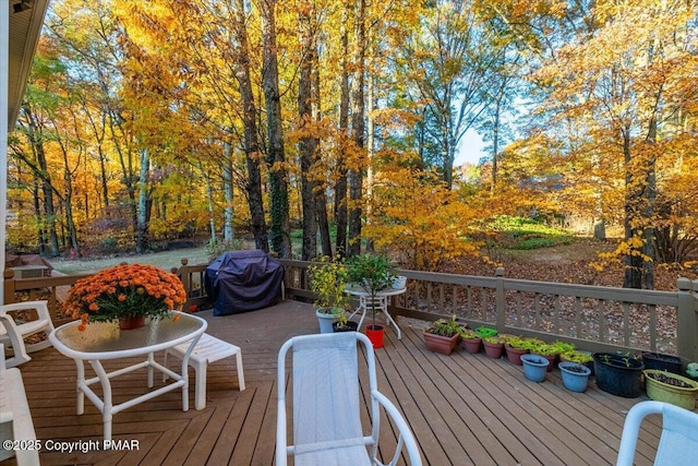 wooden terrace with grilling area