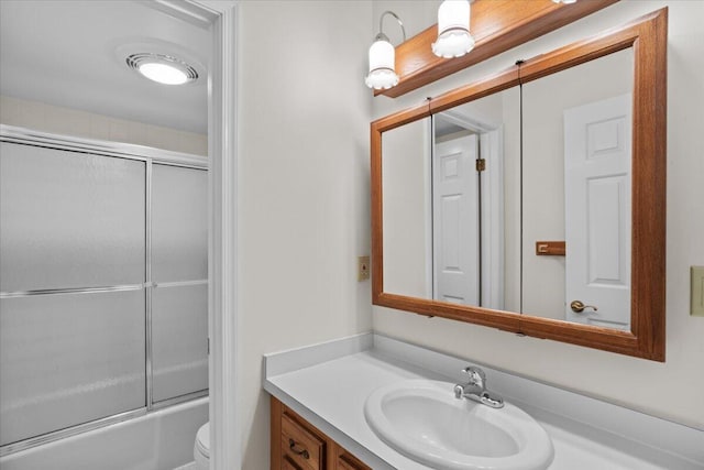 127 Ladderback Ln, Cresco, PA 18326 - bathroom featuring vanity, toilet, and combined bath / shower with glass door