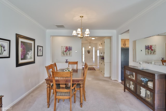11 Inverness Ln, Easton, PA 18045 - dining space with ornamental molding, a chandelier, light carpet, and baseboards