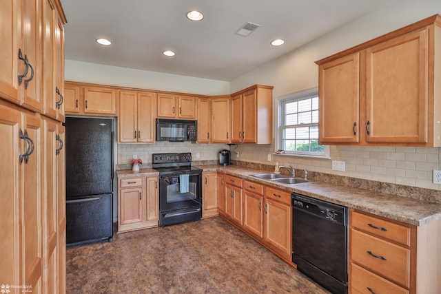 11 Inverness Ln, Easton, PA 18045 - kitchen featuring black appliances, a sink, recessed lighting, decorative backsplash, and light countertops