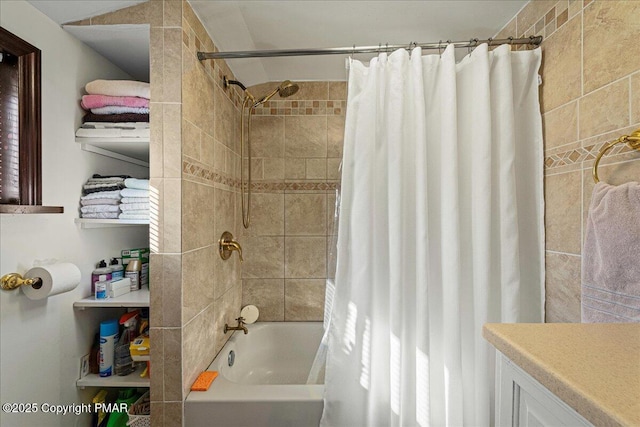 bathroom featuring vanity and shower / bath combo with shower curtain