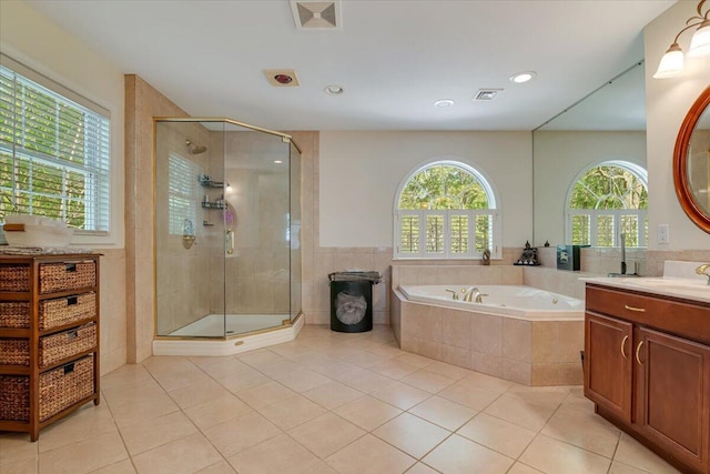 175 Wyndham Dr, Cresco, PA 18326 - bathroom featuring tile patterned floors, vanity, a tub with jets, a shower stall, and recessed lighting