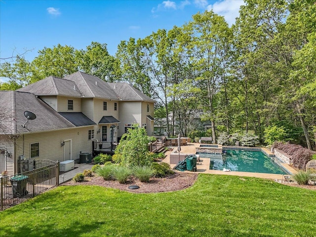 175 Wyndham Dr, Cresco, PA 18326 - back of property with a yard, a hot tub, a wooden deck, and a patio