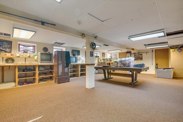 game room featuring a drop ceiling and carpet floors