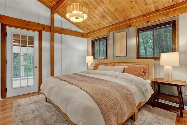 bedroom with access to outside, wood ceiling, lofted ceiling, and wood finished floors