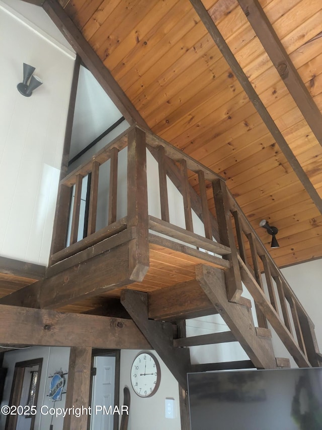 room details featuring wooden ceiling and beamed ceiling