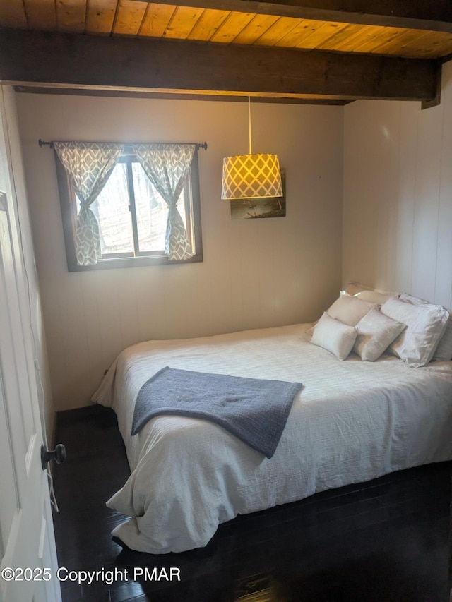 bedroom with wood ceiling and beamed ceiling