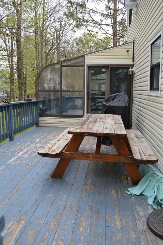 6372 Baltic Ave, Tobyhanna, PA 18466 - deck with a sunroom, outdoor dining space, and a grill