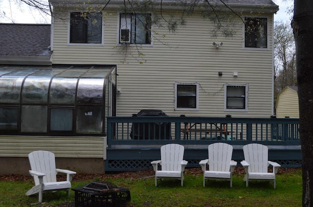 6372 Baltic Ave, Tobyhanna, PA 18466 - rear view of property featuring a sunroom and a wooden deck