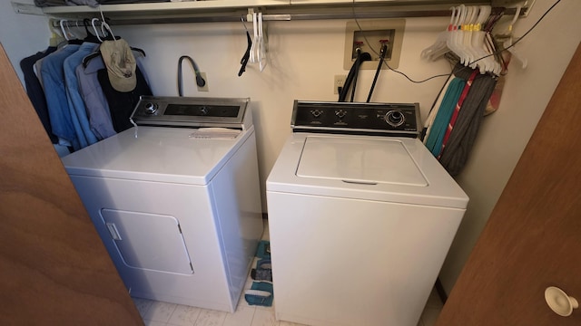 laundry room featuring washer and dryer and laundry area