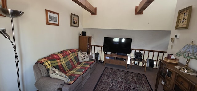 carpeted living area with beam ceiling