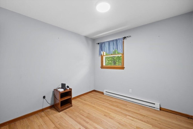 126 Keystone Ln, Tobyhanna, PA 18466 - unfurnished room featuring a baseboard radiator, light wood-type flooring, and baseboards