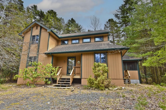 248 Miller Dr, Pocono Pines, PA 18350 - view of front of house with a shingled roof and covered porch