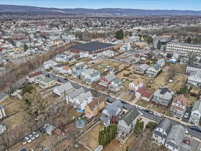 drone / aerial view with a mountain view and a residential view