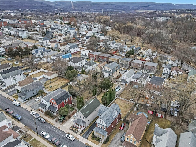 drone / aerial view with a mountain view and a residential view