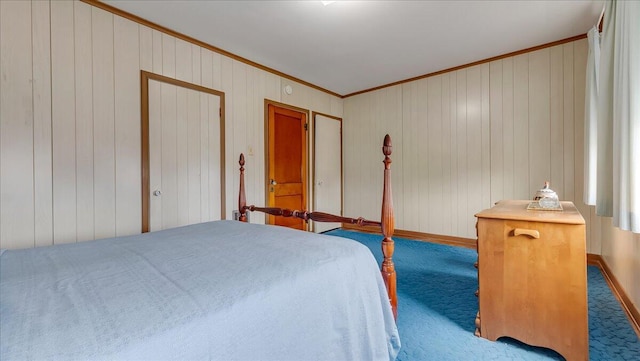 carpeted bedroom featuring crown molding