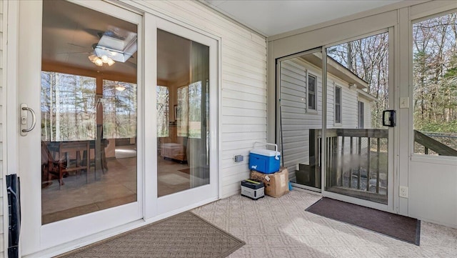 205 Flatbrook Way, Milford, PA 18337 - unfurnished sunroom with a ceiling fan and wooden walls