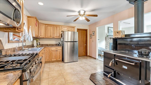 205 Flatbrook Way, Milford, PA 18337 - kitchen with a sink, light brown cabinets, light tile patterned floors, a ceiling fan, and appliances with stainless steel finishes