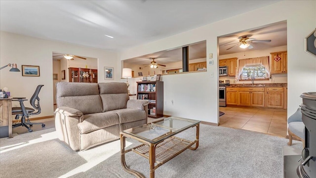 205 Flatbrook Way, Milford, PA 18337 - living area with light tile patterned floors, ceiling fan, light carpet, and baseboards