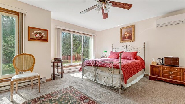 205 Flatbrook Way, Milford, PA 18337 - carpeted bedroom featuring a ceiling fan, a wall mounted AC, a baseboard heating unit, and baseboards