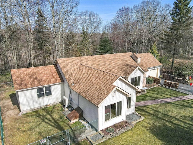 205 Flatbrook Way, Milford, PA 18337 - exterior space featuring a garage, a yard, central AC, roof with shingles, and fence