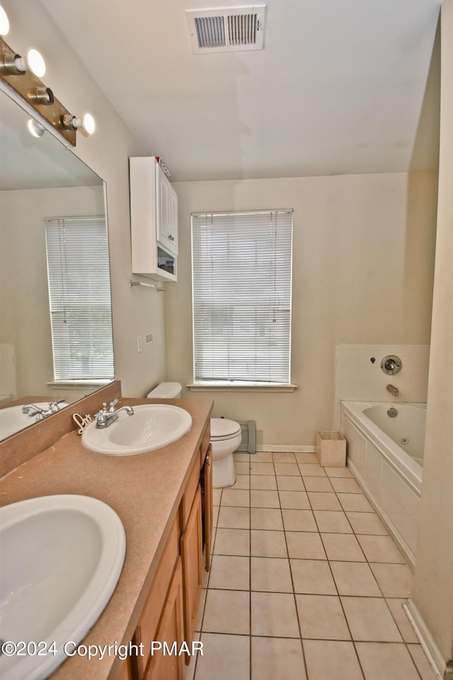 full bath with a bath, tile patterned flooring, visible vents, and a sink