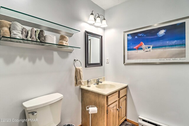 296 Overlook Way, Tannersville, PA 18372 - half bath featuring vanity, a baseboard radiator, and toilet
